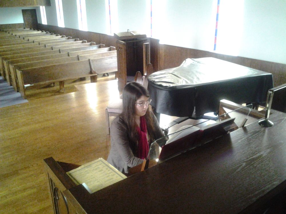Merina Gordon plays the pipe organ at Seattle's Green Lake Adventist Church